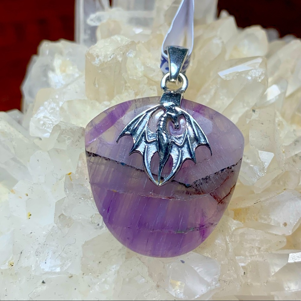 Solid sterling dragon on amethyst